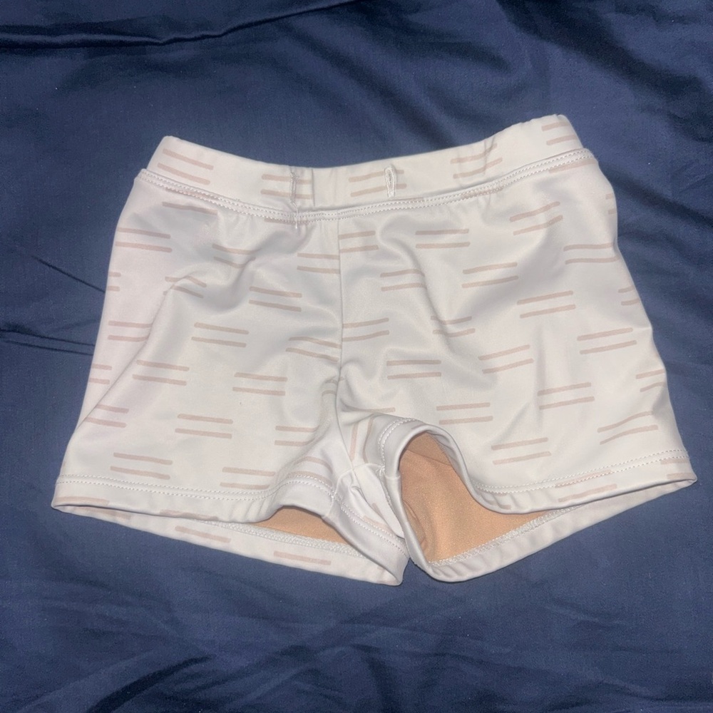 Kortni Jeane White Swim Trunks with Light Pink Stripe Accents